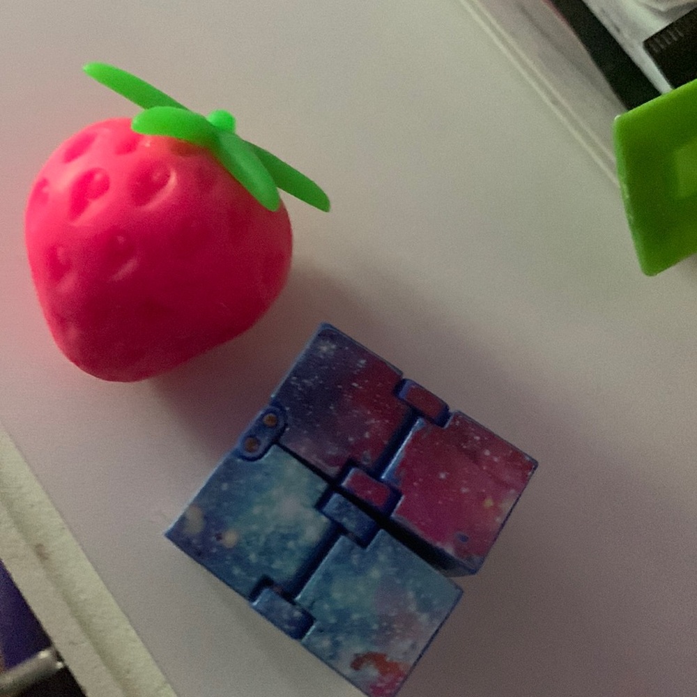 Squishy strawberry and infinity cube fidget toys